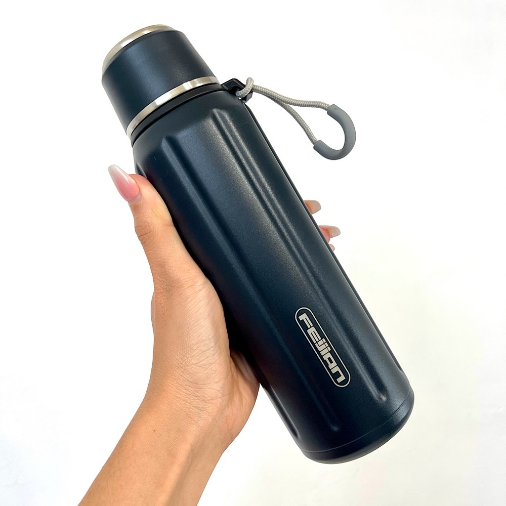 Travel stainless steel water bottle with cup